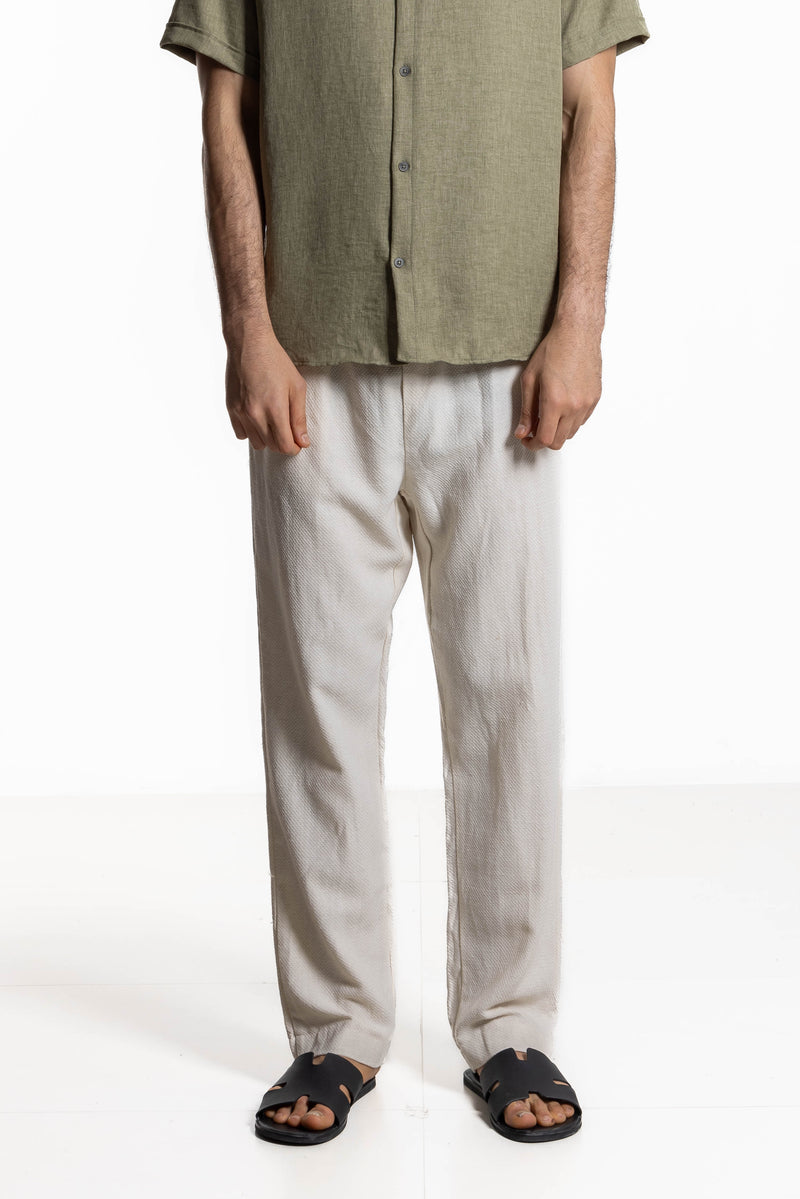 TEXTURED COTTON TROUSERS