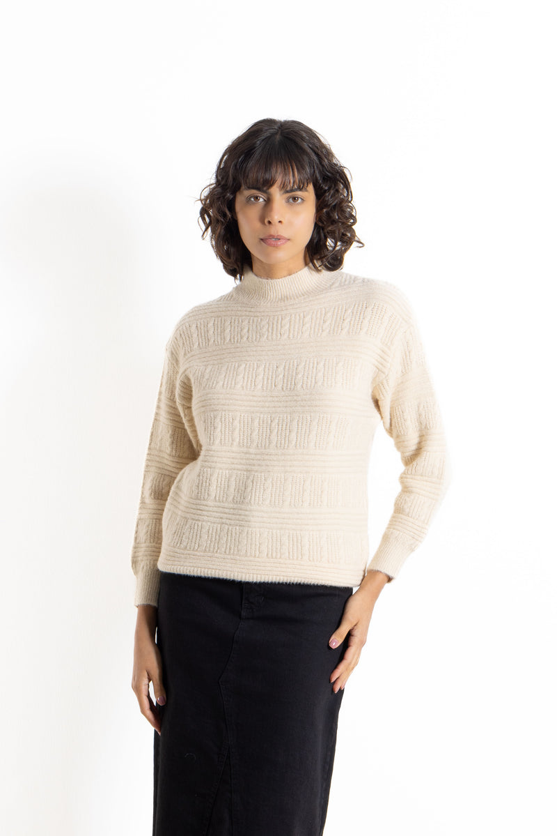 CABLE-KNIT SWEATER