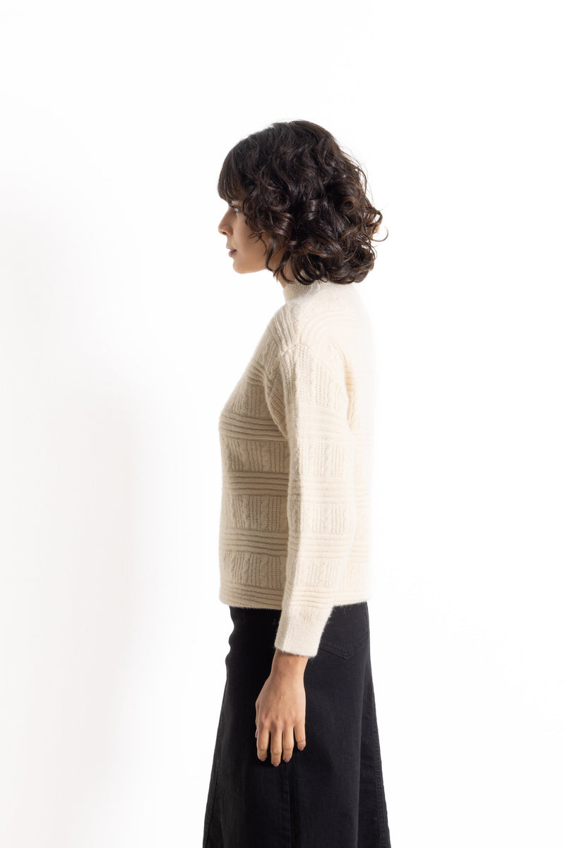 CABLE-KNIT SWEATER