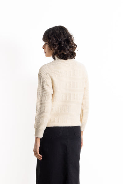 CABLE-KNIT SWEATER